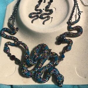 Jeweled necklace and earrings. New